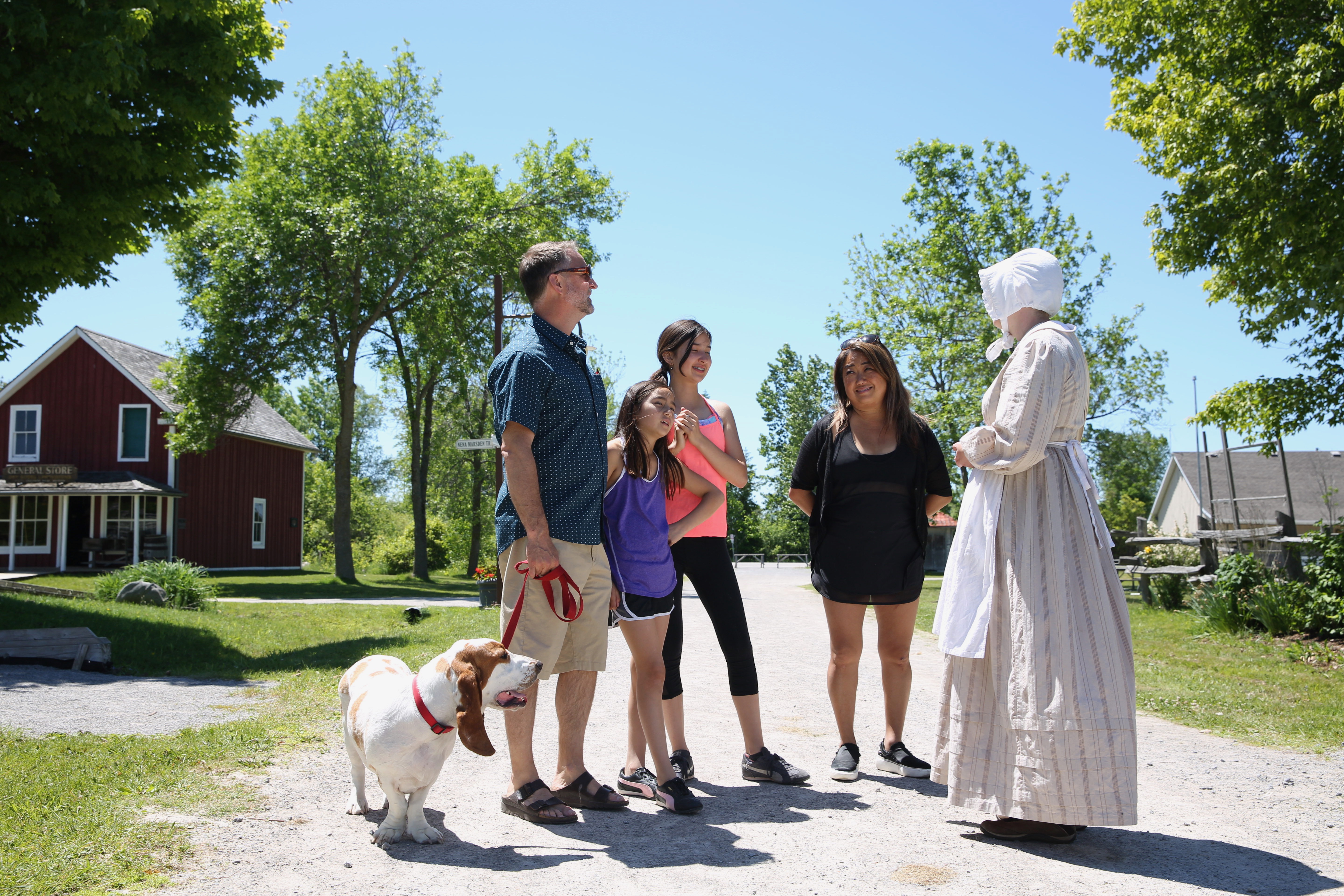 family interacting with Georgina Village staff
